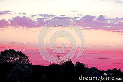 Magnificent colorful clouds in the evening sky Stock Photo