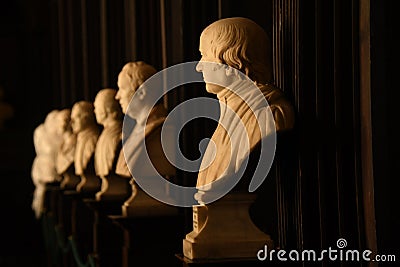 Statues of philosophers inside the Old library in Trinity College, Dublin - Ireland Editorial Stock Photo