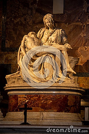 Magnificent Pieta is a work of Renaissance sculpture by Michelangelo Buonarroti Inside the St Peter`s basilica Editorial Stock Photo