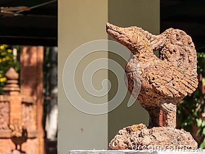 A magnificent sight to behold, a laterite carved elephant stands tall, Stock Photo