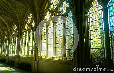 Beautiful stained-glass windows with yellow, green and blue tones. Cathedral of Burgos, Spain. Editorial Stock Photo