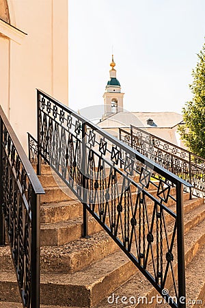 Russia,Uglich, July 2020. The staircase of an ancient Orthodox cathedral with figured railings. Editorial Stock Photo