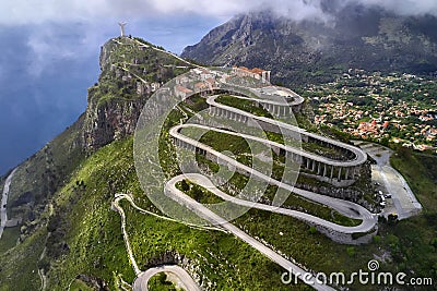 View at green cliff with statue in Maratea town in Italy Stock Photo
