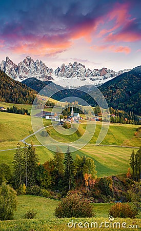 Magnificent view of Santa Maddalena village in front of the Geisler or Odle Dolomites Group. Colorful autumn sunset in Dolomite Al Stock Photo