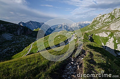 Sunrise over Mangart pass with Mangart road in foreground, Julian Alps, Triglav national park, Slovenia, Europe Stock Photo