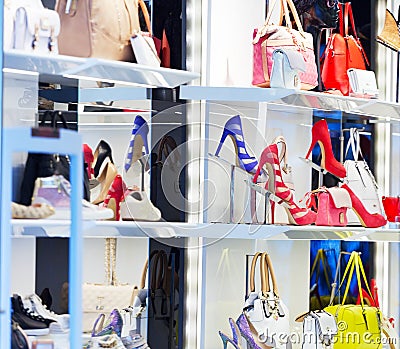 Magnificent women's shoes in a shop show-window. Editorial Stock Photo