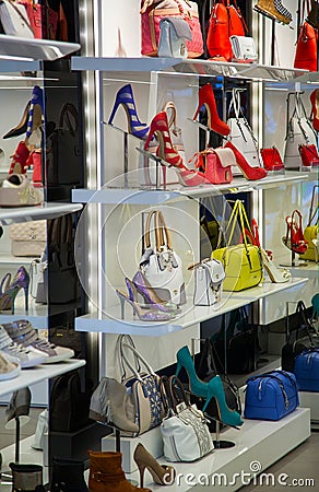 Magnificent women's shoes in a shop show-window. Editorial Stock Photo