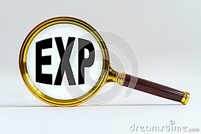 Magnifier on a white background, inside the text is written - EXP Stock Photo