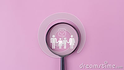 Magnifying glass with family icon for security and safety service, Access to welfare health, People with health care, Health Stock Photo