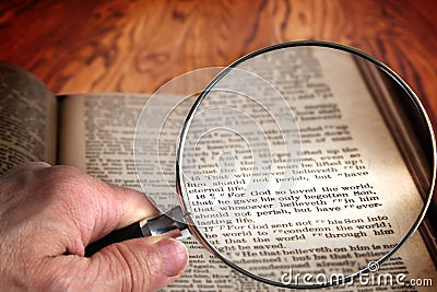 Magnifying Glass on Famous Bible Verse John 3:16 Stock Photo