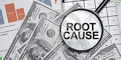 Magnifying glass over 'ROOT CAUSE' text with financial papers and currency. Financial scrutiny and audit concept Stock Photo