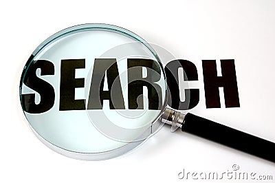 Magnifying glass and text - search Stock Photo