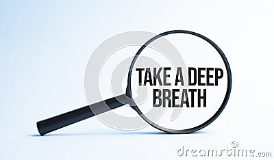 Magnifying glass with the word Take a deep breath. Business concept Stock Photo