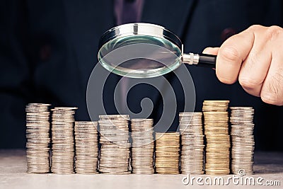 Magnifying Money, Inspect Income Stock Photo