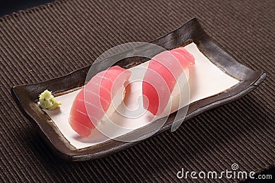 Maguro sushi, with wasabi on ceramic dish, tuna with sushi rice Stock Photo