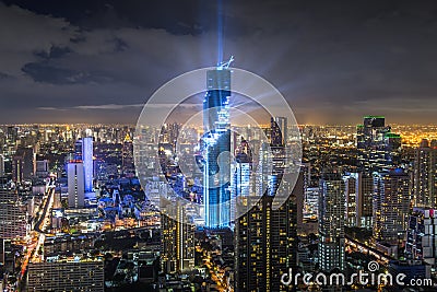 Mahanakorn tower at Bangkok city with skyline at night, Thailand Stock Photo