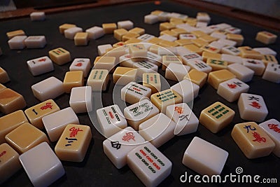 Mahjong tiles spreads on the mahjong table board Editorial Stock Photo