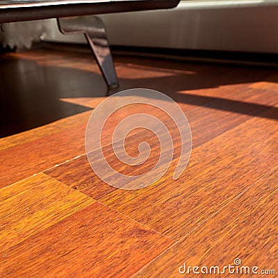 Mahogany flooring parquets in the room with armchairs in a standard home environment Stock Photo