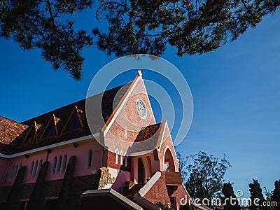 Mai Anh Domaine De Marie Church with vintage windows on brick wall, located in Da Lat, Lam Dong province, Vietnam Stock Photo
