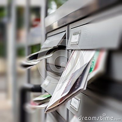 Mail box full of junk mails Stock Photo