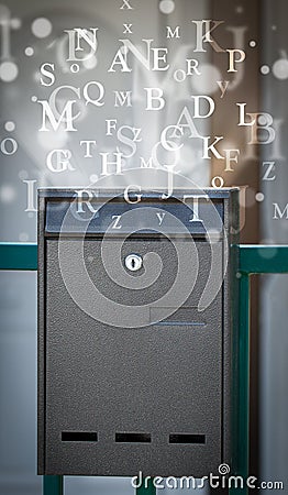 Mail box with letters comming out Stock Photo