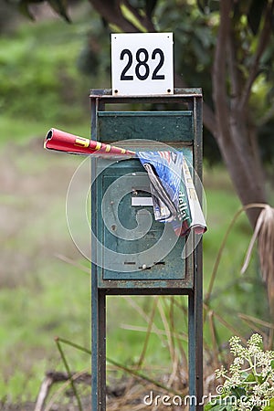 A mailbox with in the brochures of supermarkets. Blurred background. Editorial Stock Photo