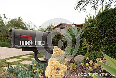 Mailbox in front of a house. Editorial Stock Photo
