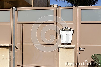 A mailbox hangs on the wall Stock Photo