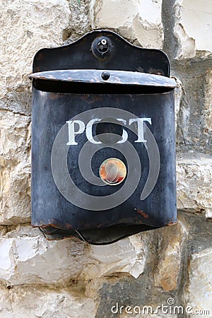 A mailbox hangs on the wall Stock Photo