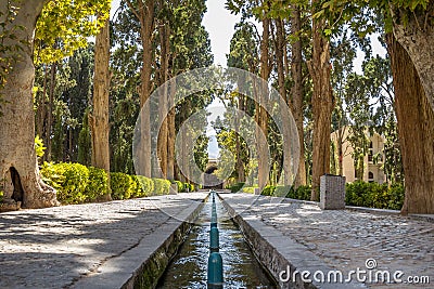 Main alley of the Kashan Fin Garden, also known as Bagh e Fin park. It is a touristic landmark of Kashan, Iran Stock Photo