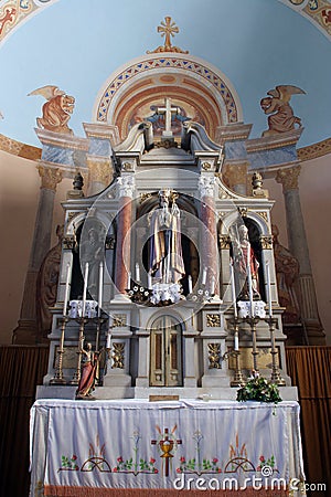 Main altar in the church of the Saint Maximilian in Posavski Bregi, Croatia Editorial Stock Photo