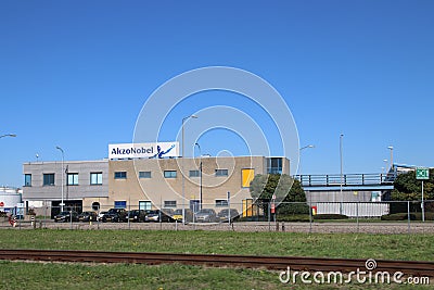 Main building of Akzo Nobel chemical plant with Tanks and pipes in the chemical industries in the Botlek Harbor in Rotterdam in th Editorial Stock Photo
