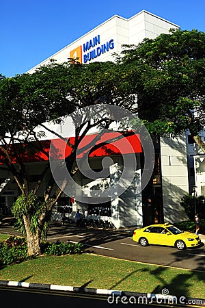 Main building of hospital and car is driving out Editorial Stock Photo