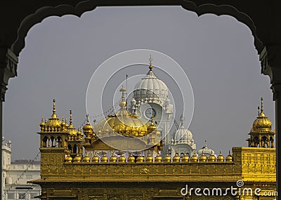 Main Dome of Golden Temple seen through Arch Stock Photo