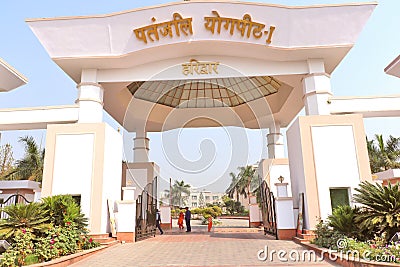 Main entrance of Headquarter building of Baba Ramdev`s Patanjali Ayurved Limited Editorial Stock Photo