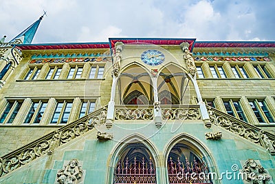 The main entrance loggia with clock in late Gothic style, Rathaus Bern, Switzerland Stock Photo