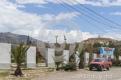 Main facade of Campo Santo and entrance to the cemetery with small plants and next to the track, located in Yungay - Peru Editorial Stock Photo