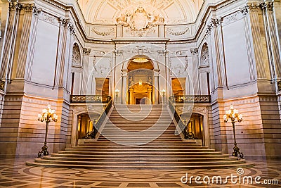 Main hall interior of the San Francisco City Hall with ornamented walls, lanterns and stairs Editorial Stock Photo