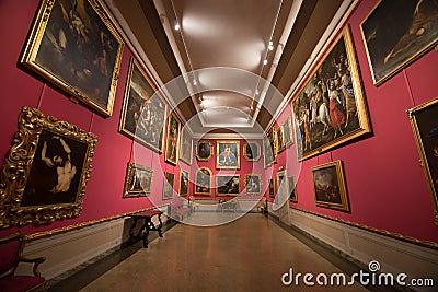 Main halls with traditional paintings in The Museo Nazionale di Palazzo Mansi in Lucca, Italy. Editorial Stock Photo