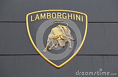 The main logo of Lamborghini sport cars on the wall Editorial Stock Photo