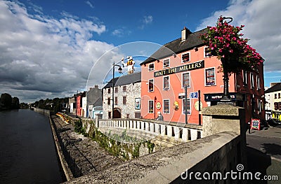 Main road, river and pub in Kilkenny downtown, Ireland Editorial Stock Photo