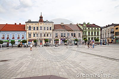 The main square of the city. Tenements around the main square. Meeting place for people, the central point of the city. Editorial Stock Photo