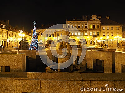Main square in historical Bielsko-Biala city center, Poland with old buildings, christmas tree, street lamps at night Editorial Stock Photo