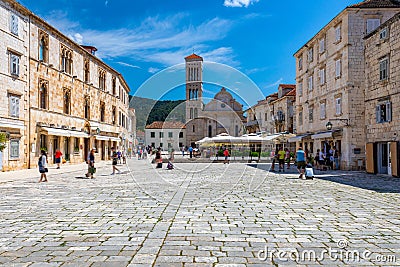 Main square in old medieval town Hvar. Hvar is one of most popular tourist destinations in Croatia in summer. Central Pjaca square Stock Photo