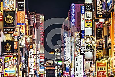 main street of Kabukicho with illuminated neon lights at night in Tokyo, Japan Editorial Stock Photo