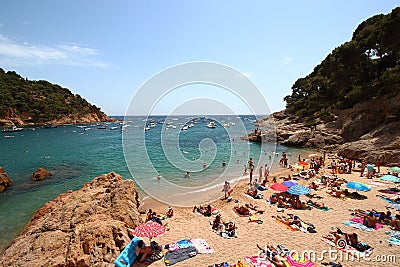 Main view of crowdy beach of Tamariu, Costa Brava, Catalonia, Spain Editorial Stock Photo