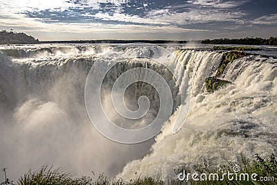 Main view of the DevilÂ´s Throat (Garganta del Diablo) from the argentinian side of IguazÃº Falls, in South AmÃ©rica. Stock Photo