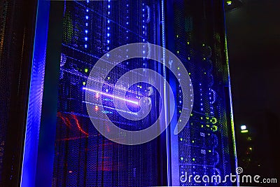 mainframe in a dark room with illumination from the server hardware Stock Photo