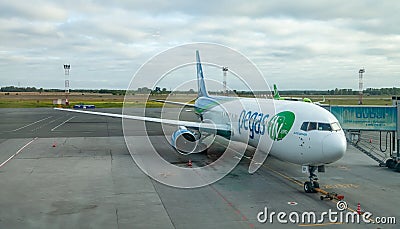 Maintainance unit preparing The Airbus boeing of pegas fly company for flight on International Russian Airport. Plane for 615 Editorial Stock Photo