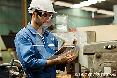 Maintenance engineer industrial plant with a tablet in hand Stock Photo